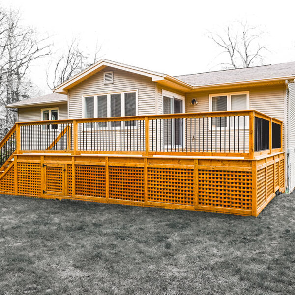 Screw piles for a deck, concealed behind deck skirting - Pro Post Foundations